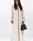 Structured Abaya in Creme with Black Piping Details