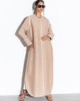 Beige Ripple abaya With White piping RTW