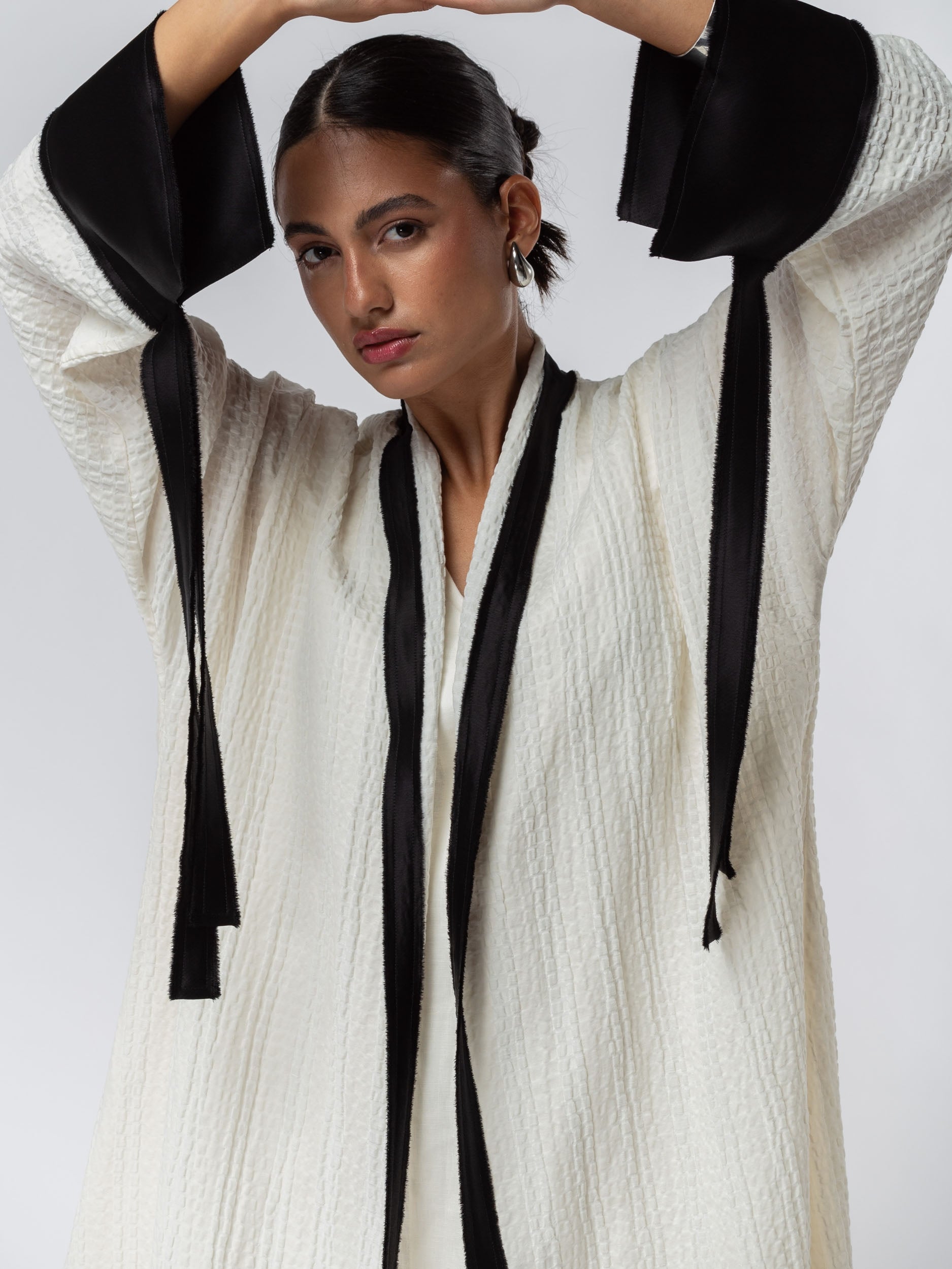 Structured Abaya in Ivory with Black Details  RTW