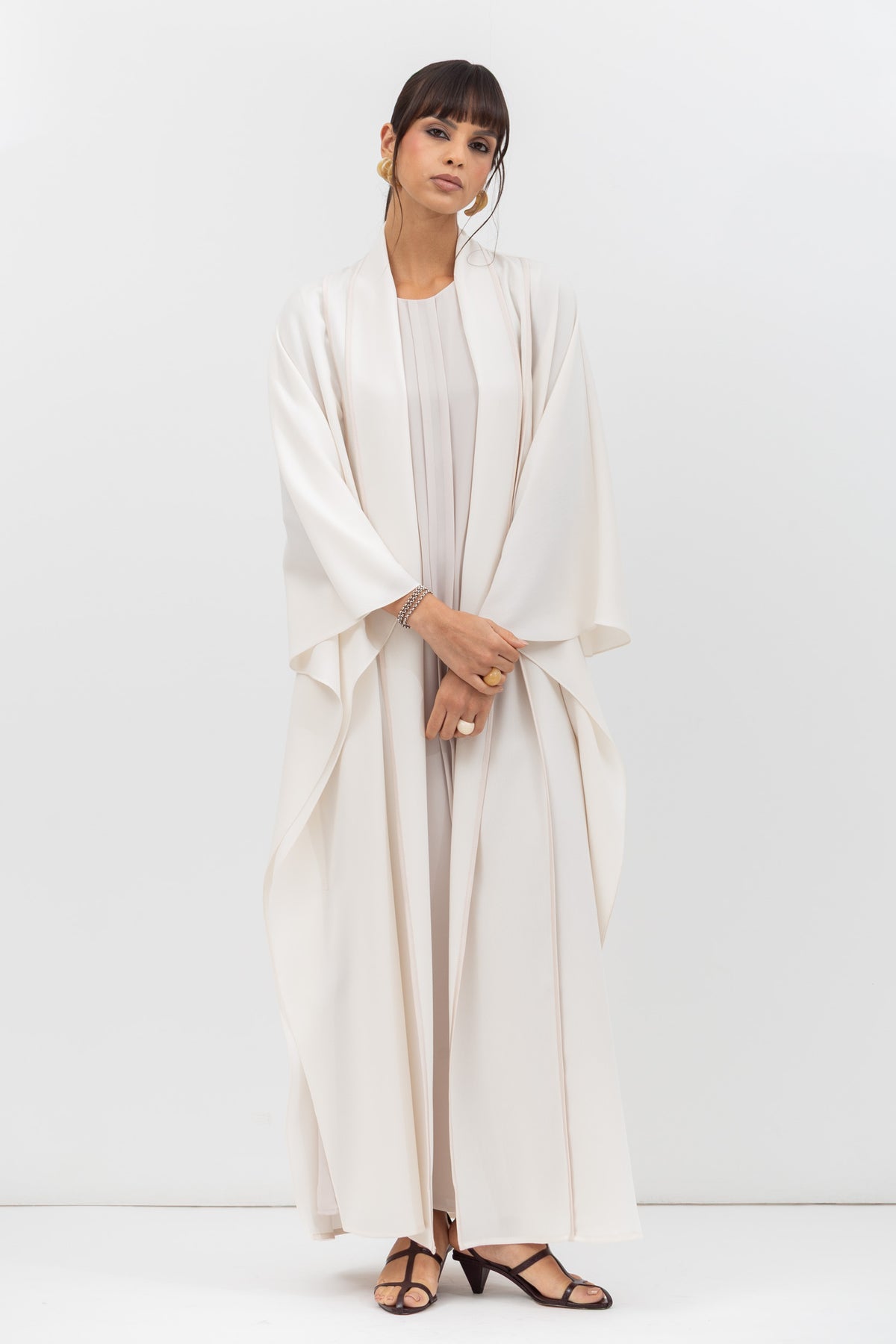 Flow Abaya in Tencel Twill with Piping Detailing in Ivory RTW
